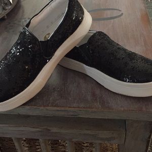 Black sequin slip on sneakers